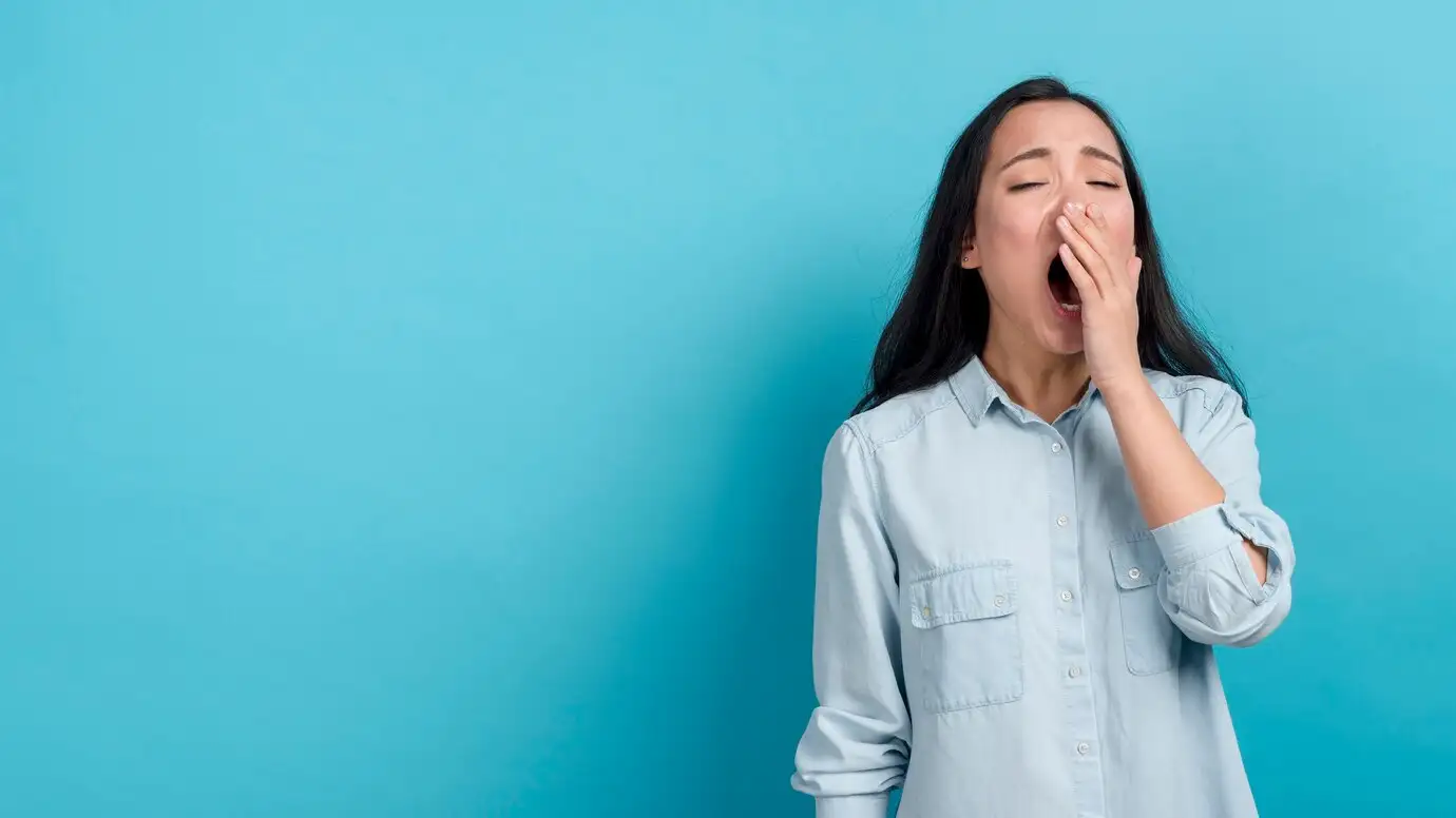 Hình ảnh minh họa về ngáp liên tục, biểu tượng của phong thủy và tâm linh.